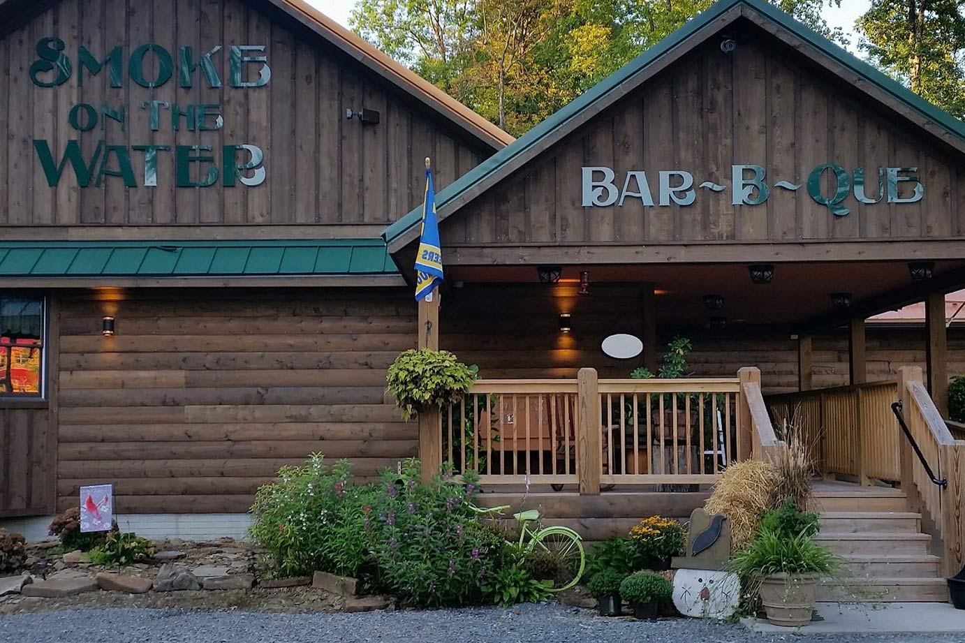 The log-cabin restaurant with its Smoke on the Water Bar-B-Que sign